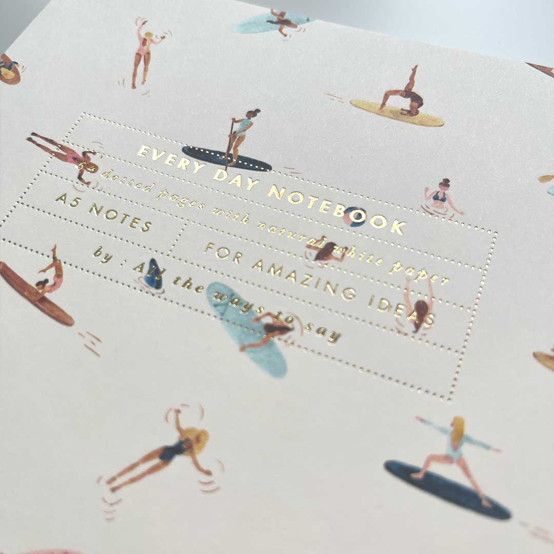 Close-up of gold foil print on Paddle notebook from All the ways to say yes.