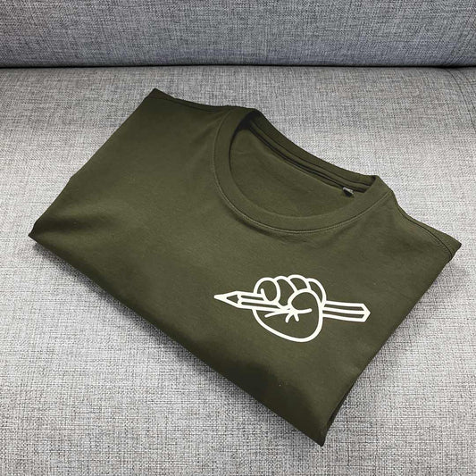 Olive green folded T-shirt from Kidler Goods 'Art at Heart' fist holding up a pencil