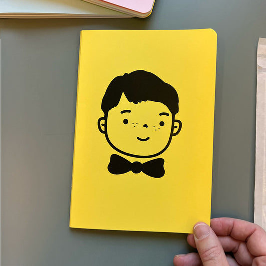 Quirky yellow notebook 'Bow Tie Boy' from Kidler Goods