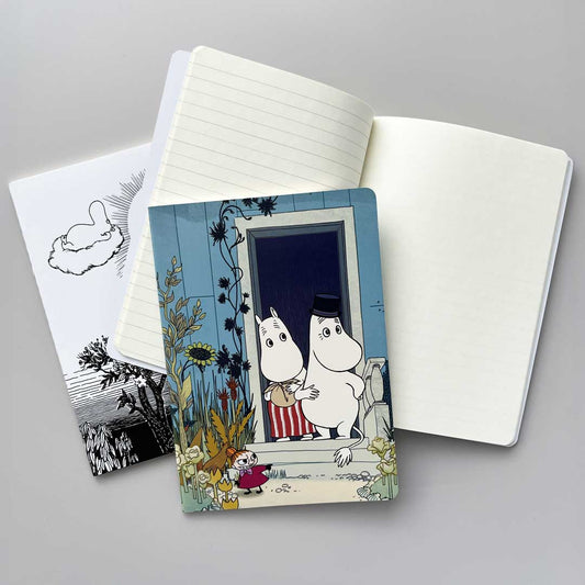 Trio of notebooks with Moomin illustrations with ruled pages