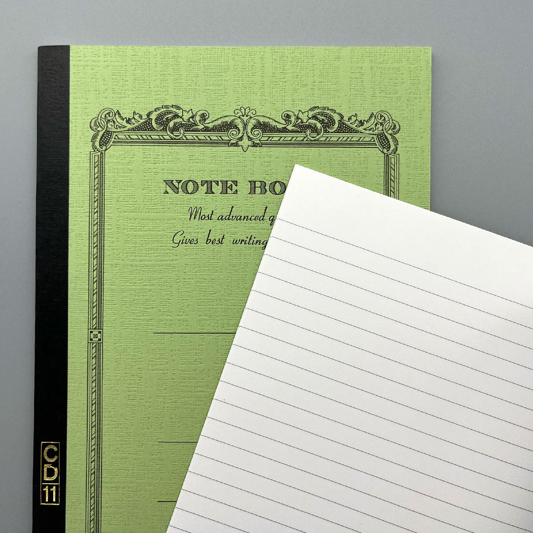 Green Apica notebook with ruled paper