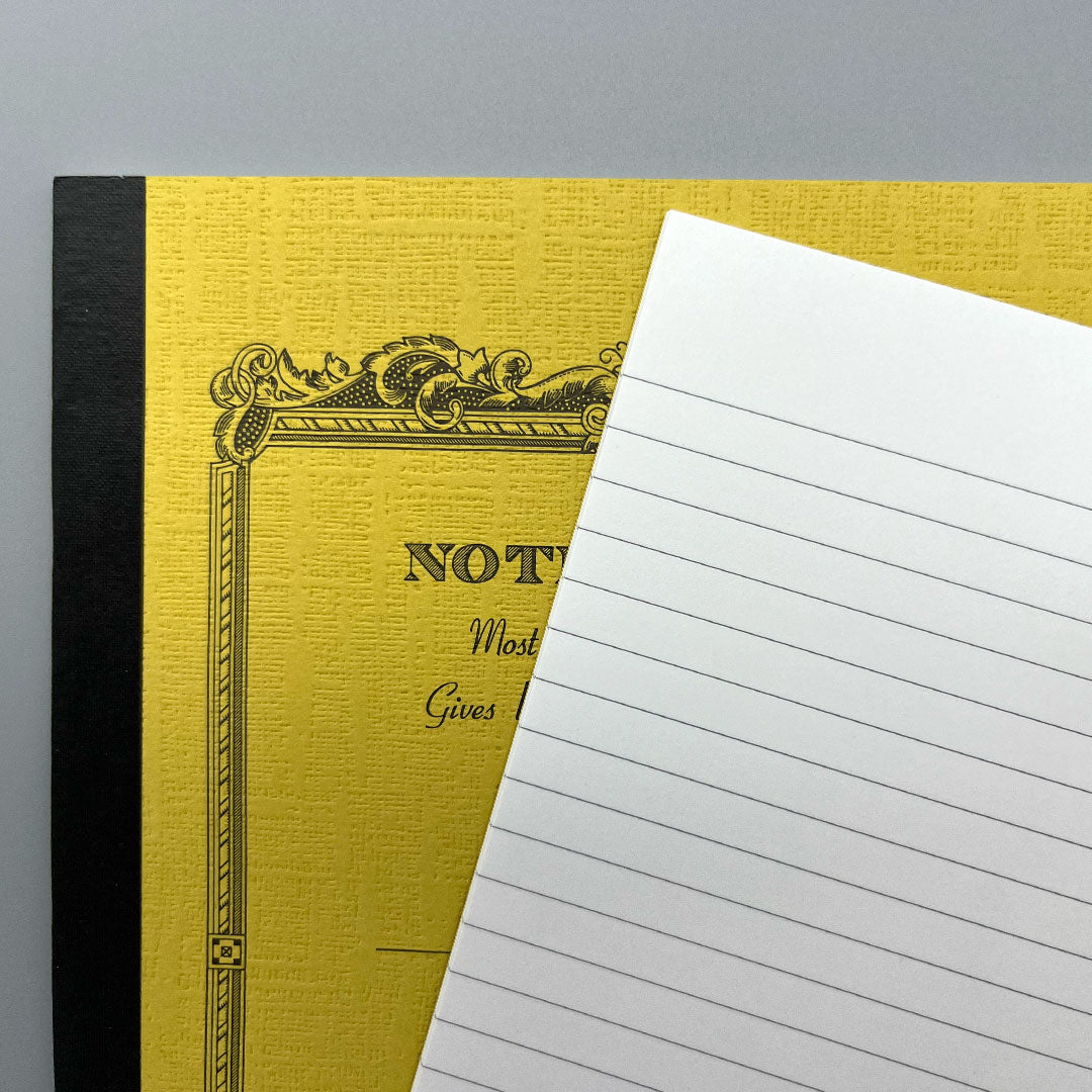 Yellow Apica notebook with ruled paper