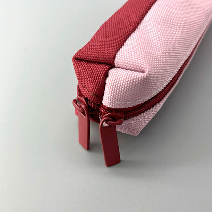 Duo coloured pencil case in red and pink